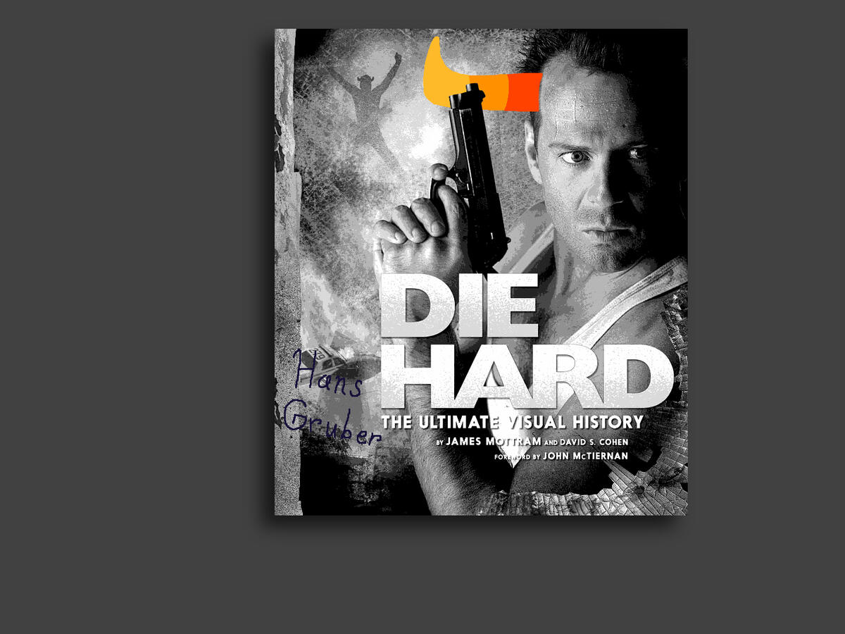 A hung black and white poster of DIE HARD with yellow horns on Bruce Willis. It is signed by Hans Gruber.